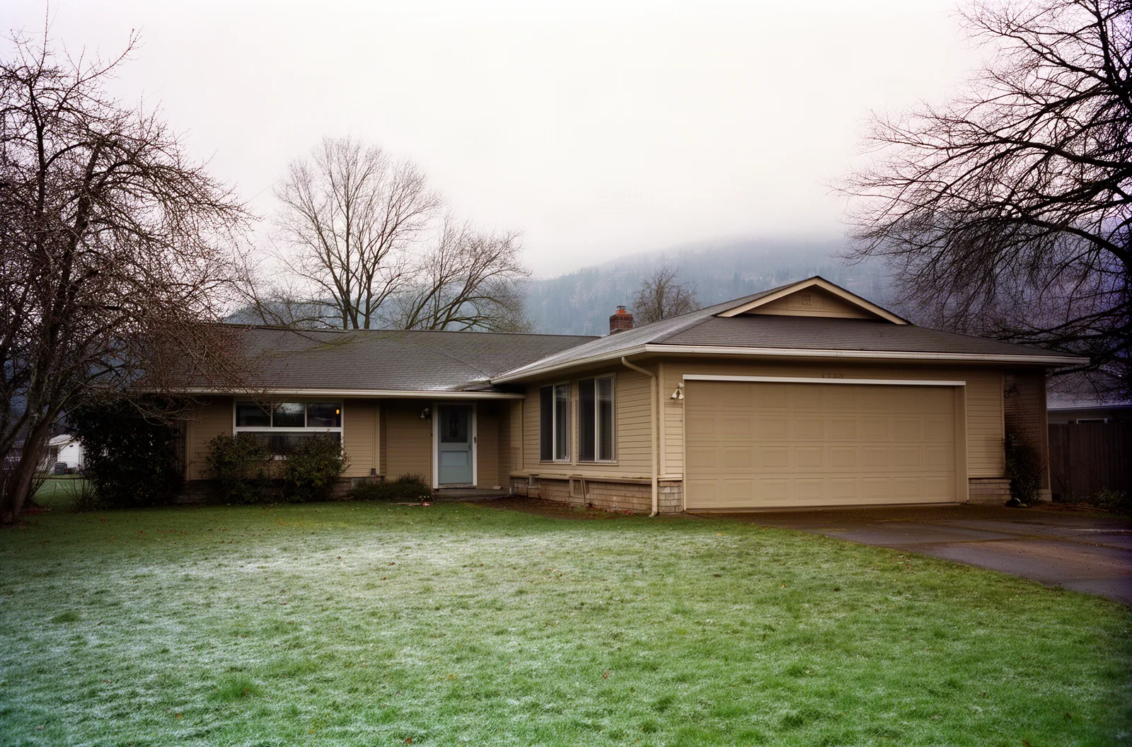 A Gresham ranch house with an attached garage on a cold morning