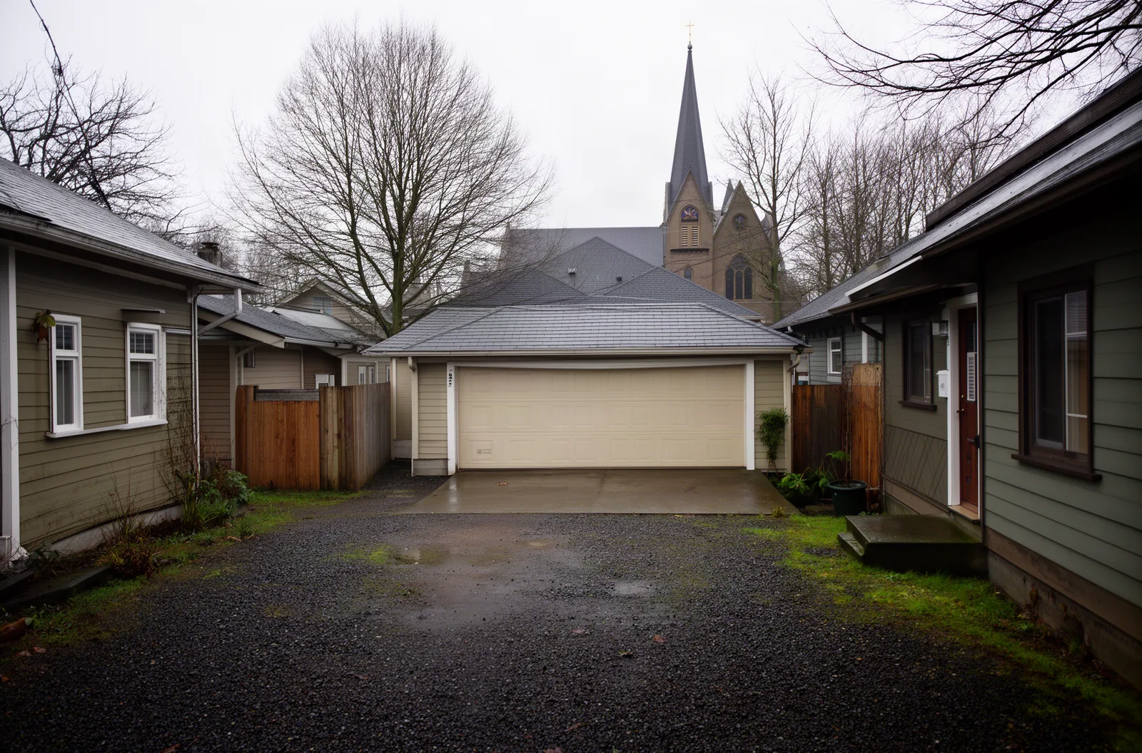 A North Portland alley lined with small detached garages